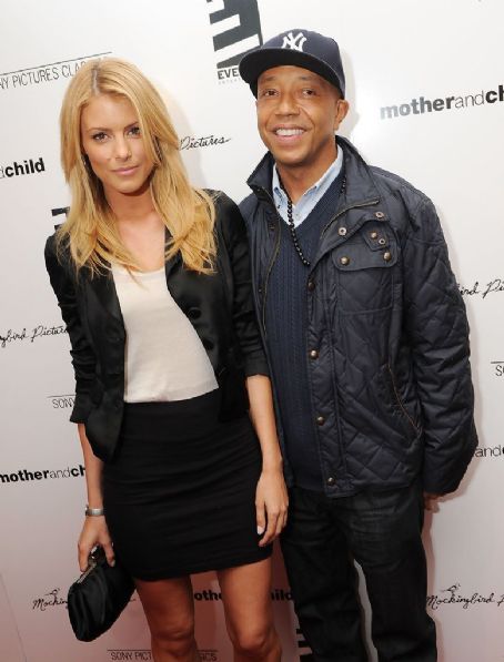 Paige Butcher and Russell Simmons