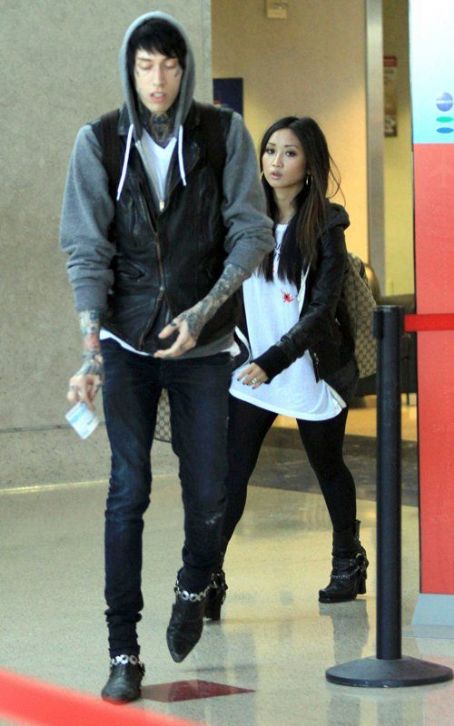 Trace Cyrus and Brenda Song were spotted at Los Angeles International