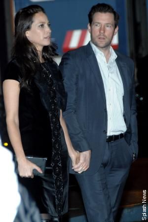 Director Ed Burns holds hands with his wife Christy Turlington at The Food