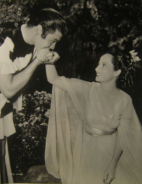 Merle Oberon and Turhan Bey