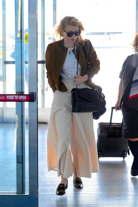 Amber Heard – Spotted at JFK Airport in New York - FamousFix