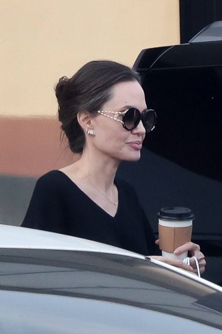 Angelina Jolie – In an all-black ensemble as she picks up food to go in Los Feliz