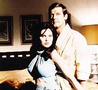 Roger Moore and Madeline Smith