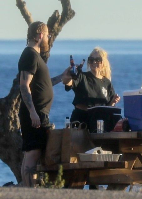 Avril Lavigne -Fishing with friends off the coast in Malibu