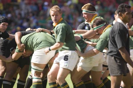 MATT DAMON (center) as Francois Pienaar in Warner Bros. Pictures' and Spyglass Entertainment's drama 'Invictus,' a Warner Bros. Pictures release. Photo by Keith Bernstein