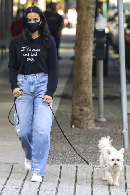 Camila Mendes – Taking her dog for a walk in Vancouver - FamousFix