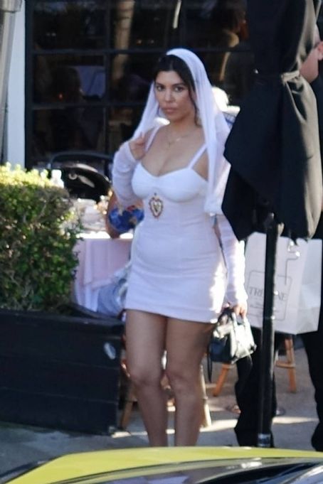 Kourtney Kardashian – With Travis Barker getting married at a Restaurant in Montecito