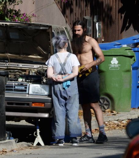 Kelly Osbourne – With her boyfriend Erik Bragg helping him fix his old station wagon in Los Angeles