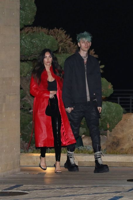 Megan Fox – In a red leather trench coat and PVC pants at Nobu Malibu