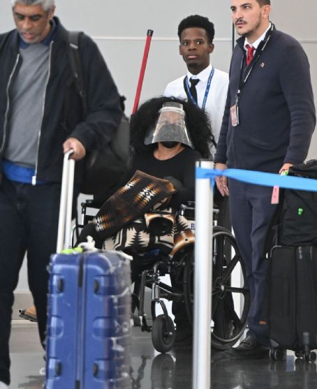 Diana Ross wears two protective masks at JFK Airport in New York