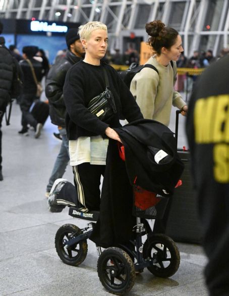 Megan Rapinoe – Seen with her partner Sue Bird arriving at JFK Airport in New York