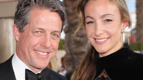 Hugh Grant and Anna Elisabet Eberstein