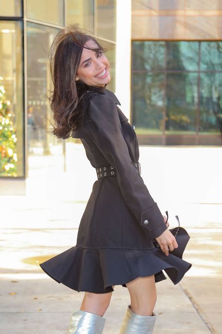 Sofia Carson in silver boots in New York