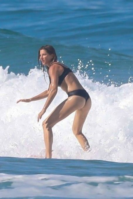 Gisele Bündchen – In a bikini Hits the waves in Costa Rica