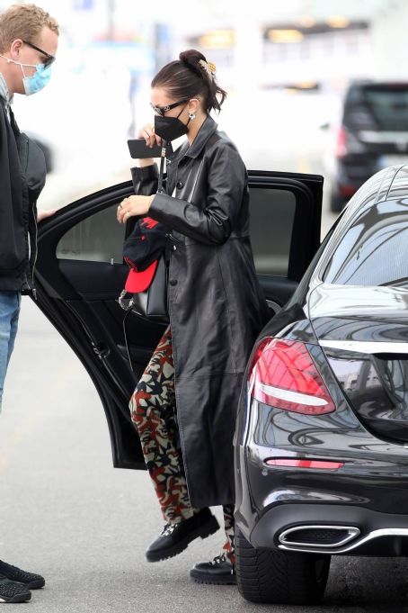 Bella Hadid – Pictured with her bodyguard while leaving her hotel and ...