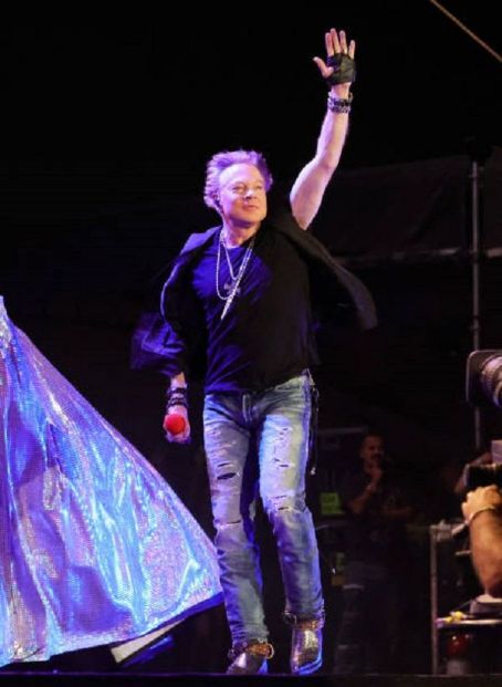 INDIO, CALIFORNIA - APRIL 30: Axl Rose of Guns N' Roses performs onstage with Carrie Underwood during Day 2 of the 2022 Stagecoach Festival at the Empire Polo Field