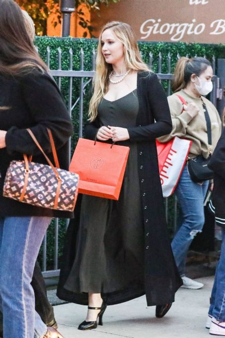 Jennifer Lawrence – In a dark dress arrives at Giorgio Baldi in Santa