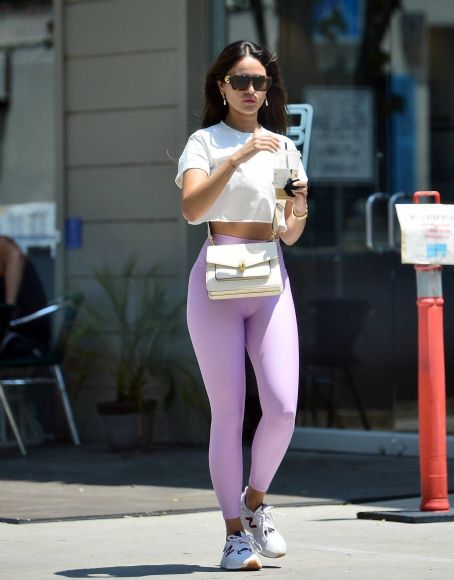 Eiza Gonzalez models a pink bra top and matching leggings