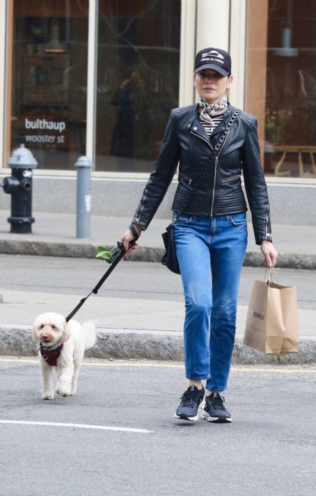 Julianna Margulies – Wearing a black biker’s leather jacket in Manhattan’s SoHo area