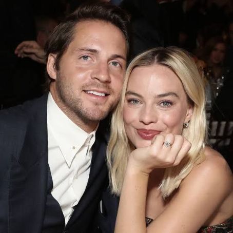 Margot Robbie and Tom Ackerley