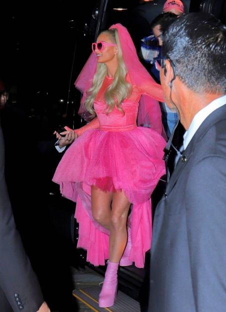 Paris Hilton – In neon pink bridal outfit at wedding after party at the Santa Monica Pier