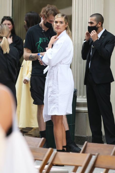 Kate Upton – In a white bathrobe during New York Fashion Week