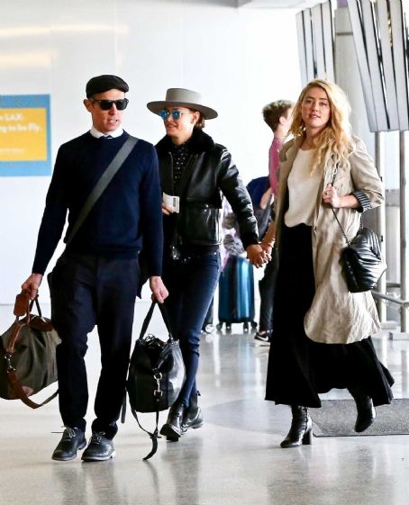 Amber Heard and Bianca Butti depart from LAX - FamousFix.com post