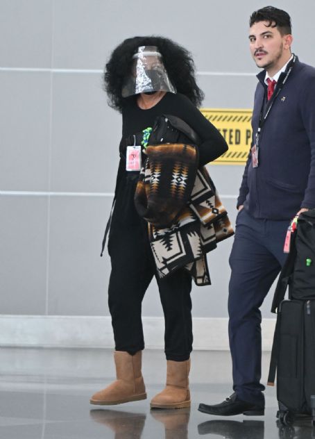 Diana Ross wears two protective masks  at JFK Airport in New York