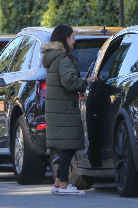Mila Kunis – Out in olive green puffer jacket in Beverly Hills