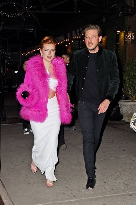 Bella Thorne – Seen on Valentine’s Day in a pink fur coat with boyfriend Mark Emms in NY