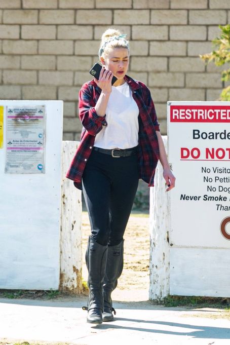 Amber Heard – Horseback riding candids in Los Angeles - FamousFix