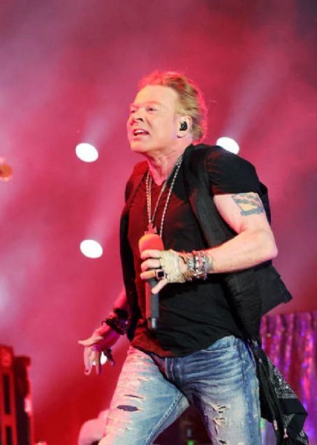 INDIO, CALIFORNIA - APRIL 30: Axl Rose of Guns N' Roses performs onstage with Carrie Underwood during Day 2 of the 2022 Stagecoach Festival at the Empire Polo Field