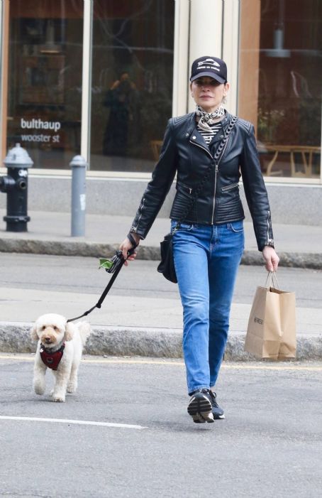Julianna Margulies – Wearing a black biker’s leather jacket in Manhattan’s SoHo area