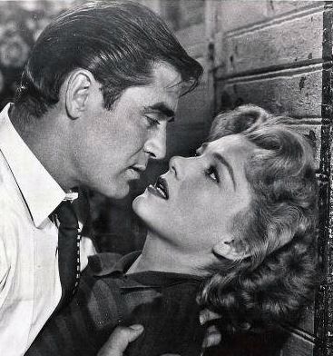 Anne Baxter and Steve Cochran