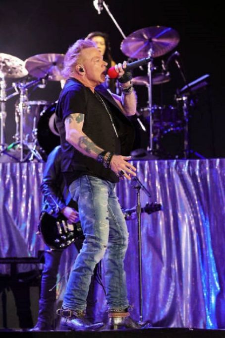 INDIO, CALIFORNIA - APRIL 30: Axl Rose of Guns N' Roses performs onstage with Carrie Underwood during Day 2 of the 2022 Stagecoach Festival at the Empire Polo Field
