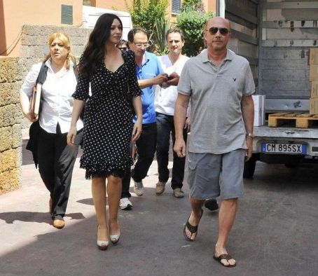 Monica Bellucci seen wearing a black and white polka dot dress while ...