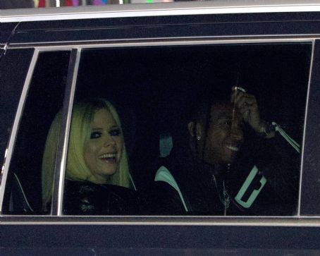 Avril Lavigne – With Tyga step out to SZA’s concert at the Kia Forum in Los Angeles