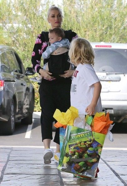 Gwen Stefani & hubby Gavin Rossdale attending a birthday party with their sons Apollo and Zuma in Los Angeles, California on December 21, 2014