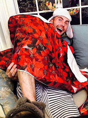 Peek-a-Boo! Adam Levine Pops Up Out of Behati Prinsloo's Wrapping Paper