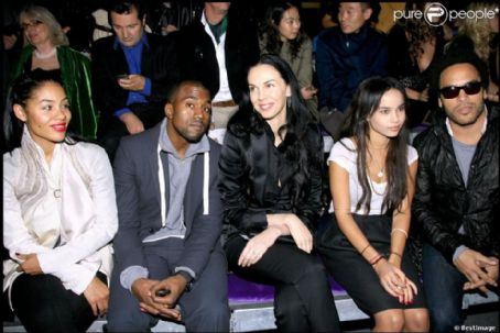 Kanye West, L'Wren Scott, Zoe and Lenny Kravitz attend the Yves Saint Laurent Fashion Show Spring/Summer 2007, on October 5, 2006 in Paris, France