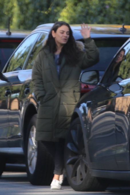 Mila Kunis – Out in olive green puffer jacket in Beverly Hills