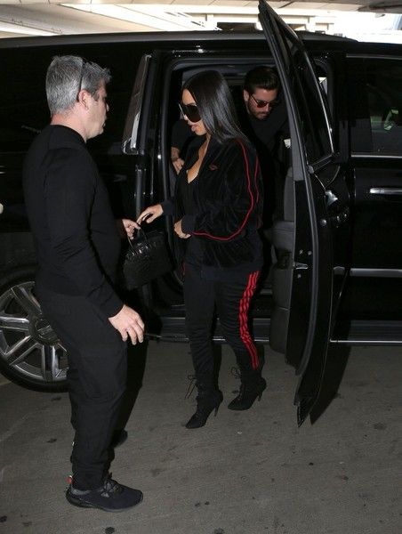 Scott Disick departing on a flight at LAX airport for Kim's