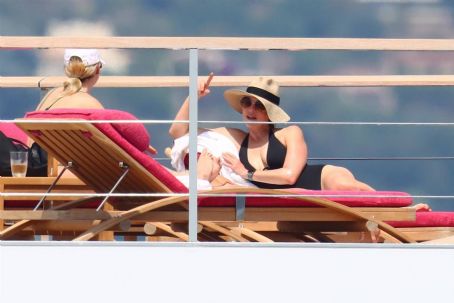 Laurene Powell In a bikini pn her yacht Venus with her daughter