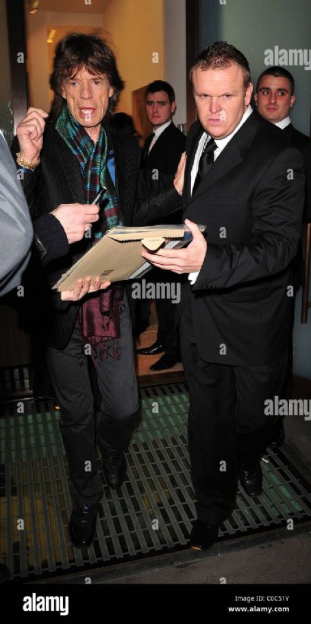 L'Wren Scott and Mick Jagger leaving the Sadie Coles gallery in Mayfair, after viewing a new exhibition of John Currin paintings - 2 April 2008